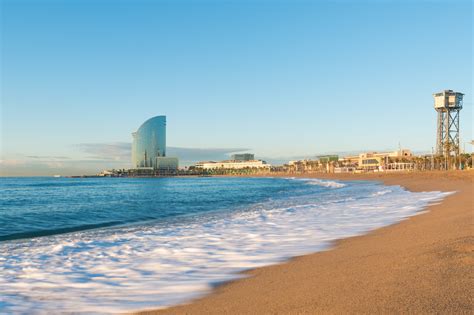 Barceloneta Beach in Barcelona with colorful sky at sunrise. Sea - 9 ...