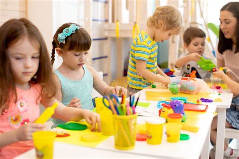 Group of Preschool Children Engaged in Handcrafts Stock Image - Image ...