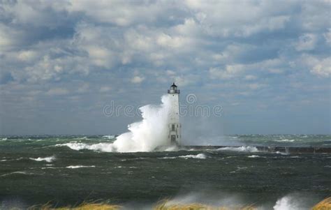 Lighthouse in Storm stock image. Image of michigan, storm - 16714923