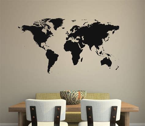 a wall decal with the world map on it's side in black and white