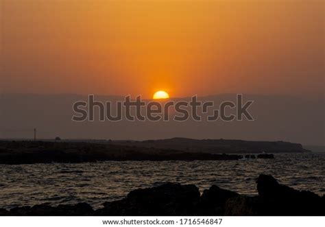 Half Yellow Sun Visible Sun Sets Stock Photo (Edit Now) 1716546847