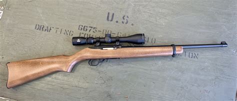 Ruger 10/22 rifle with 9x scope - wood stock