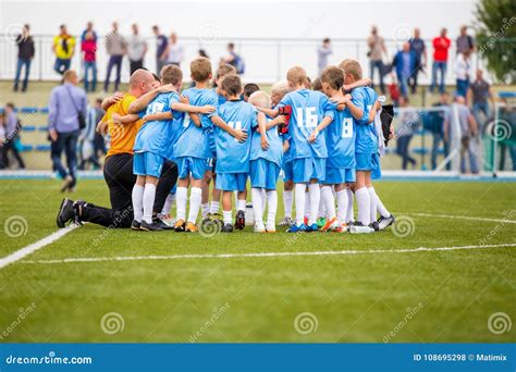 Children Soccer Football Team with Coach. Group of Kids Standing ...