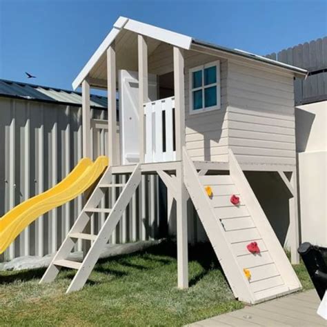 Toby Kids Playhouse with Double Swing, Slide and Climbing Wall 2.1m²