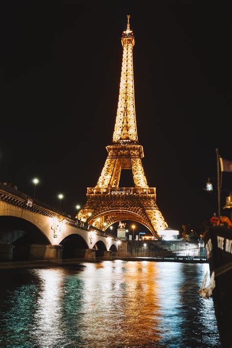 Low Angle Shot of the Eiffel Tower with illuminated light in 2020 ...