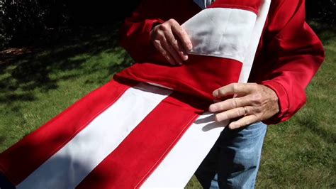 How to fold an American Flag | Activity days, Awareness, American flag