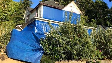 "Goonies" house owners cover residence with blue tarp