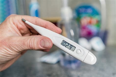 Thermometer Reading A Fever Stock Photo - Download Image Now - iStock