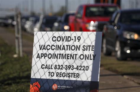 Houston halts COVID-19 vaccine appointments after slots fill quickly