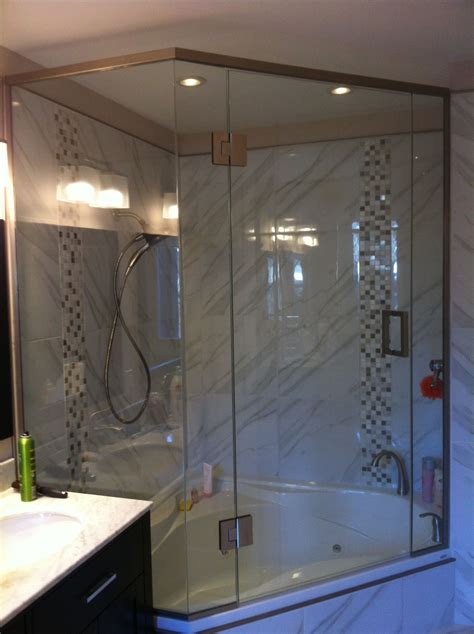 Shower enclosure above neo angle jacuzzi tub , Square hardware brushed ...