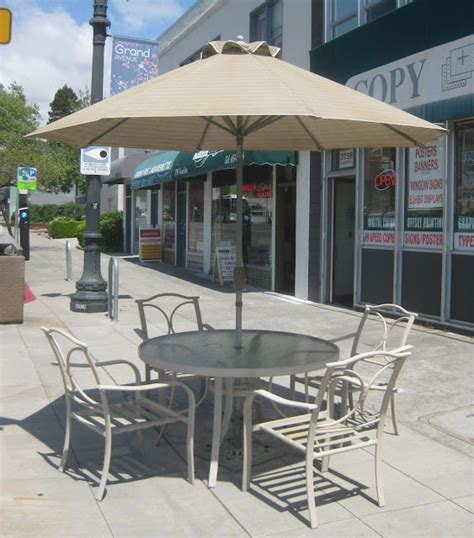 UHURU FURNITURE & COLLECTIBLES: SOLD - Patio Set with Umbrella - $200