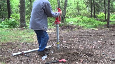 How To Install A Hand Pump Water Well. The Tent Well. Finally. - YouTube