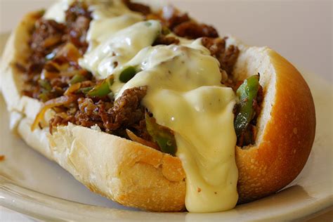 Slow Cooker Philly Cheese Steak Sandwiches - The Cooking Mom