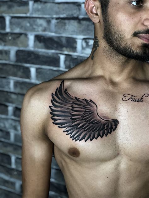 Share more than 66 tattoos wings on chest - in.cdgdbentre