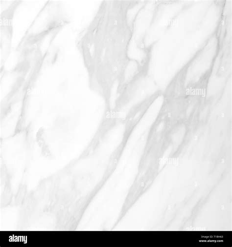 Marble texture on white marbled tile, closeup photo on marbled tile ...