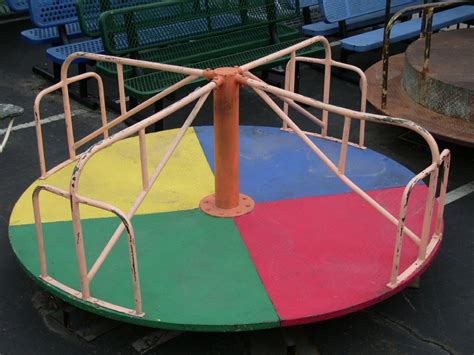 Playground - Vintage Multi-Colored Merry-Go-Round in Playground / Park ...