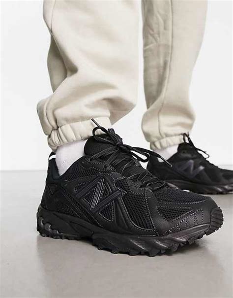 New Balance 610 trainers in triple black | ASOS