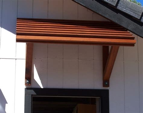 Wood Awning For Front Door | Porch awning, Window awnings, Wood railing