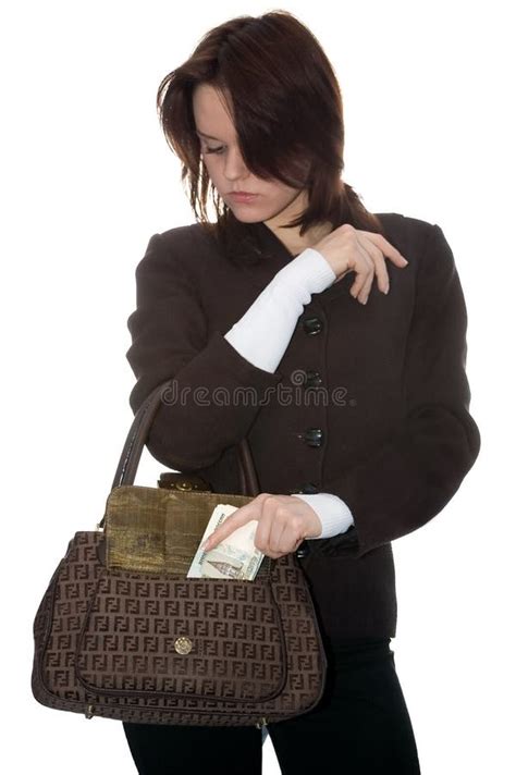 The Girl Puts Money in a Bag Stock Photo - Image of accounting, finance ...