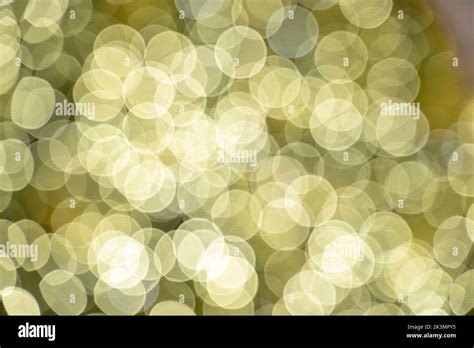 A bokeh lights effect with shades of yellow Stock Photo - Alamy