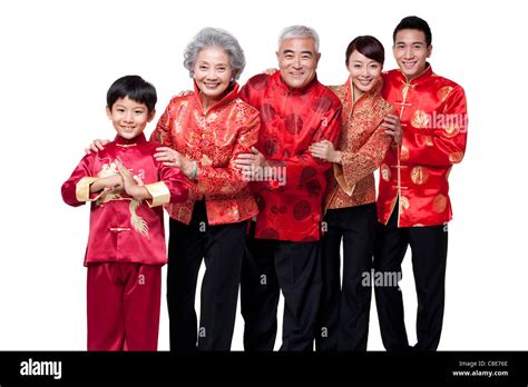 Family Dressed in Traditional Clothing Celebrating Chinese New Year ...