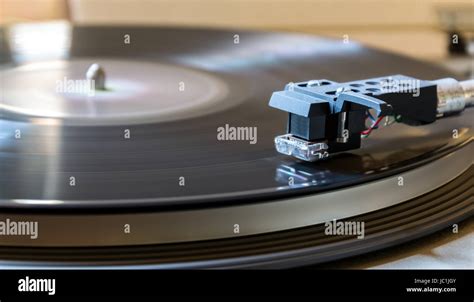 Modern record player with a vinyl Stock Photo - Alamy