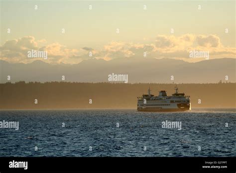 Ferry trip during sunset Stock Photo - Alamy