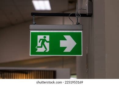 Green Emergency Exit Sign Showing Way Stock Photo 2251953169 | Shutterstock