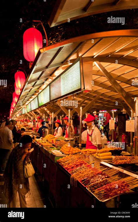 serving exotic food at the Wangfujing night market, Beijing,PRC Peoples ...