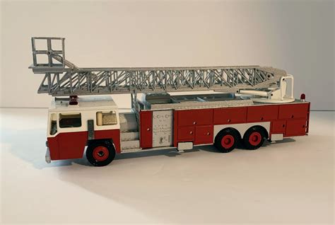 E-One 95' Aerial Ladder w/Bucket 3 Axle Fire Truck - The Fire Bell