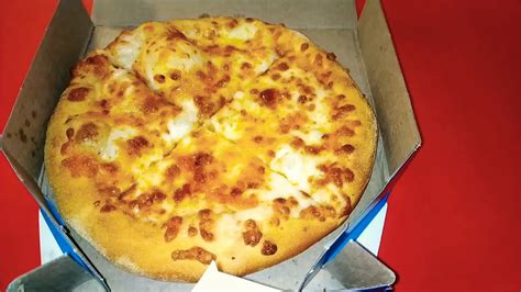 Which cheese is used in Domino's pizza?