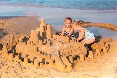 building sandcastles | Beach activities, Travel and leisure, Vacation trips