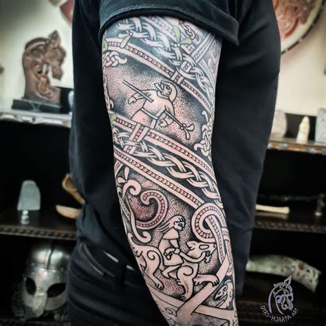 Intricate Viking Tattoo Sleeve Design for Men