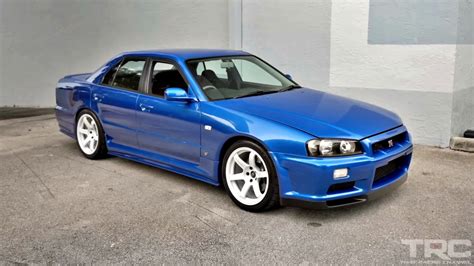 Family-Friendly Godzilla: Remembering The Ultra-Rare 4-Door R34 Nissan ...