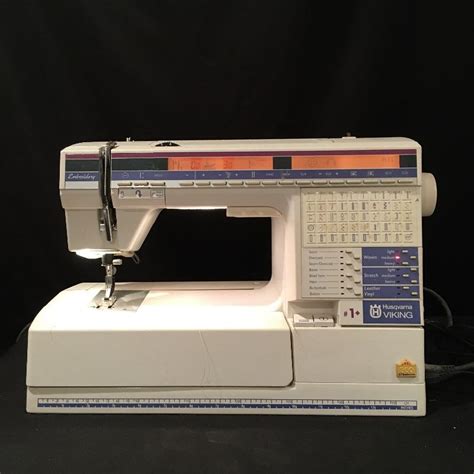 Lot 214 - Viking Husqvarna 300 Sewing Machine & More | EstateSales.org