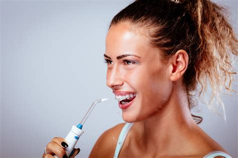 Dental Implants Aftercare: Is a Water Flosser the Right Tool? - Alicia ...