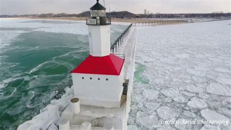 Michigan City Lighthouse Ice Shelf amazing aerial footage. - YouTube