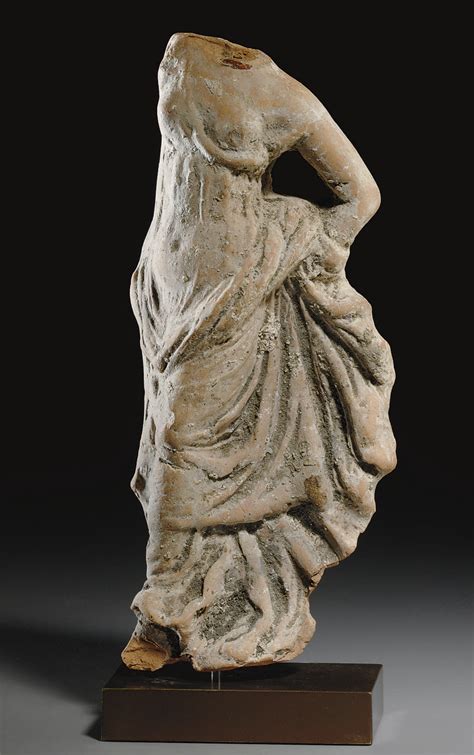 A GREEK TERRACOTTA FEMALE FIGURE , HELLENISTIC PERIOD, CIRCA 3RD ...