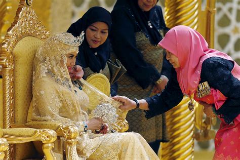 Brunei royal wedding: And the bride wore gold, diamonds, rubies and ...