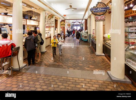 Shoppers inside Quincy Market food stalls and shops downtown Boston ...