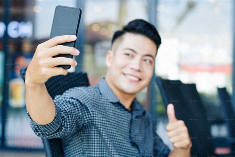 Young Man Taking Selfie - Stock Photos | Motion Array