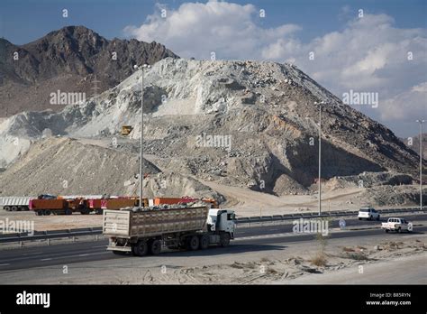 Fujairah mountains highway traffic uae Stock Photo - Alamy