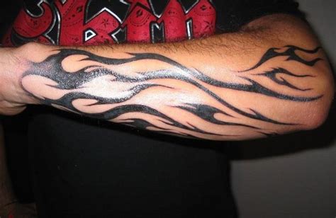 Fire Tattoo On Arm | Flame tattoos, Fire tattoo, Wrist tattoos