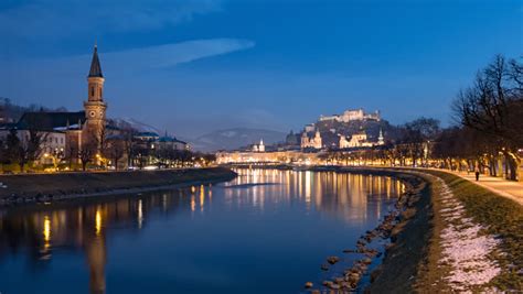 The fortress, Cathedral, and river at night in Salzburg, Austria image ...