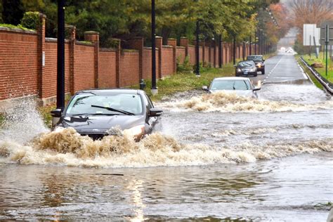 Drenching rains flood DC-area roads as record for wettest year swims ...