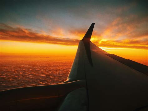 Silhouette of Airplane during Sunset · Free Stock Photo