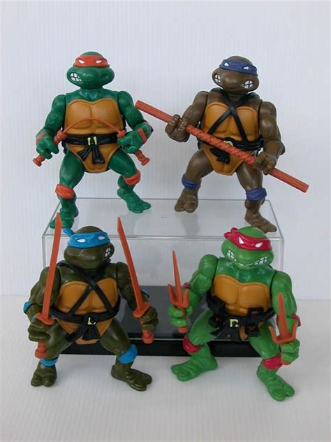 Who remembers these priceless TMNT 90's action figures? The movies were ...