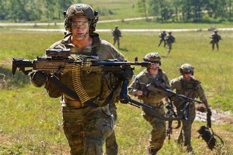 U.S. Soldiers with the 75th Ranger Regiment conduct a training raid ...