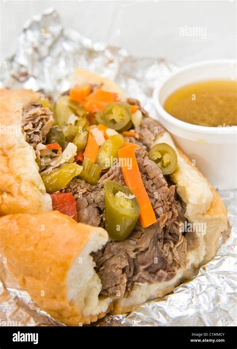 Chicago style Italian beef sandwich with giardiniera and dipping sauce ...