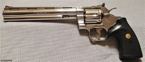 COLT PYTHON .357 MAGNUM WITH 8 INCH BRIGHT STAINLESS STEEL FINISH WITH CASE